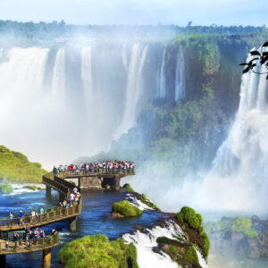 Tourists at Iguazu Falls, one of the world's great natural wonders, on the border of Brazil and Argentina.